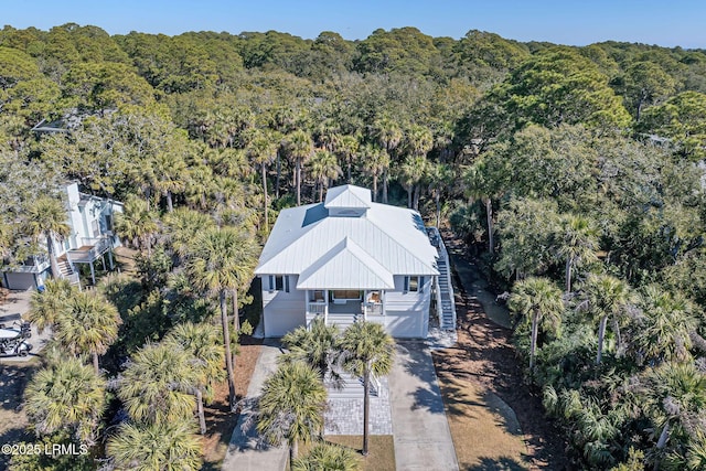 drone / aerial view with a view of trees