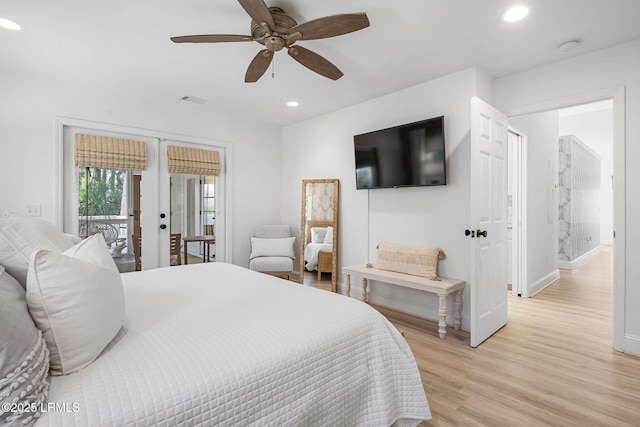 bedroom featuring recessed lighting, visible vents, access to outside, french doors, and light wood-type flooring