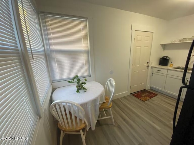 1712 Battery Park Dr, Port Royal, SC 29935 - dining room featuring wood finished floors and baseboards