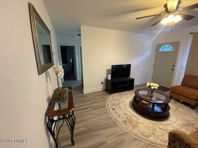 1712 Battery Park Dr, Port Royal, SC 29935 - living area with ceiling fan, wood finished floors, and baseboards