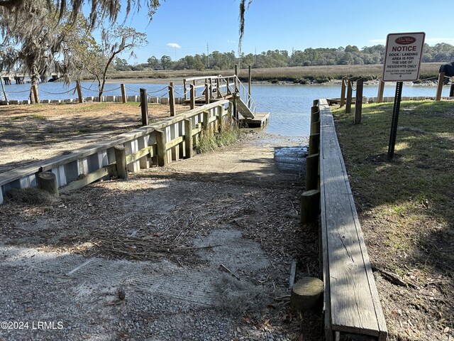 dock area with a water view