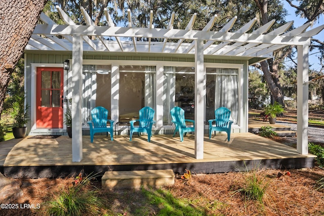 exterior space featuring a deck and a pergola