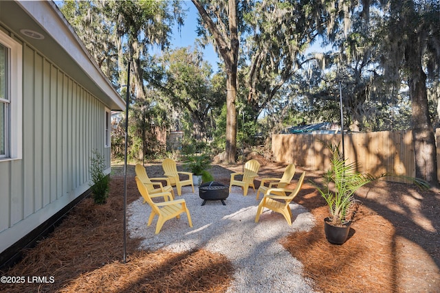 view of patio featuring an outdoor fire pit