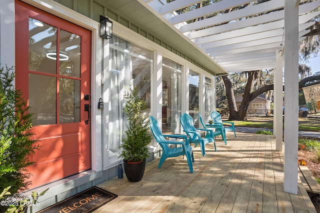 wooden deck with a pergola