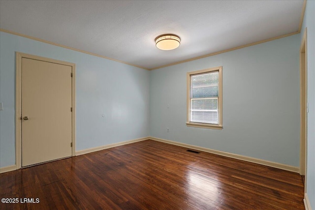 1803 Sixth St, Beaufort, SC 29902 - spare room with ornamental molding and wood finished floors