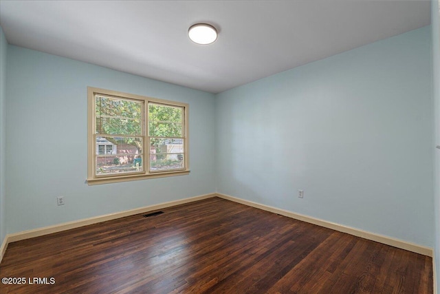 1803 Sixth St, Beaufort, SC 29902 - unfurnished room with dark wood finished floors and baseboards