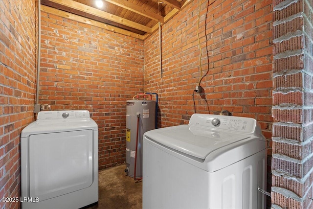 1803 Sixth St, Beaufort, SC 29902 - laundry area with water heater, brick wall, wood ceiling, and washer and clothes dryer
