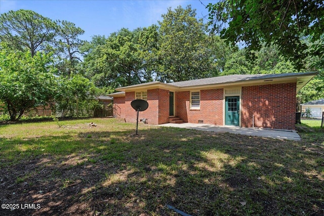 1803 Sixth St, Beaufort, SC 29902 - rear view of house featuring entry steps, brick siding, crawl space, and a patio area