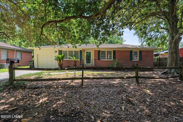 1803 Sixth St, Beaufort, SC 29902 - single story home with an attached garage, driveway, and brick siding