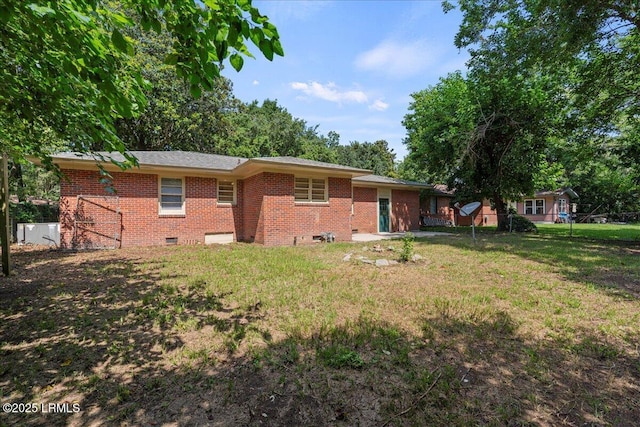 1803 Sixth St, Beaufort, SC 29902 - back of house featuring brick siding and crawl space