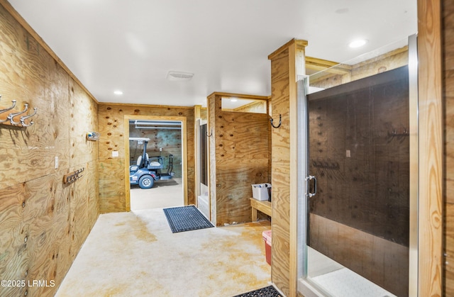 bathroom featuring a shower stall