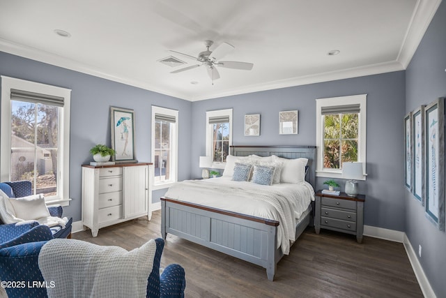 bedroom featuring baseboards, visible vents, dark wood-style floors, ceiling fan, and crown molding