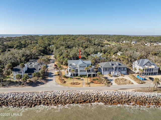 aerial view featuring a water view and a residential view