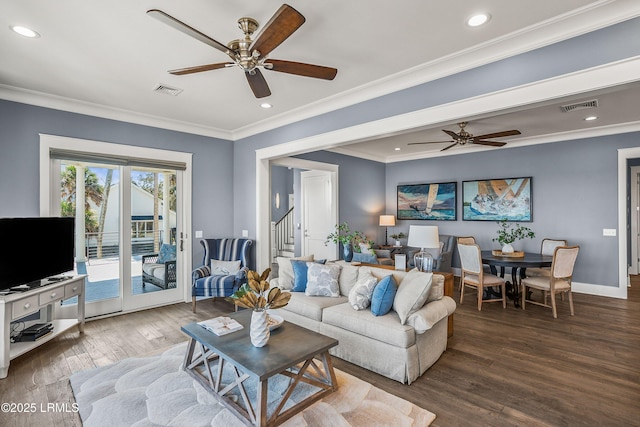 living area featuring ornamental molding, wood finished floors, visible vents, and recessed lighting