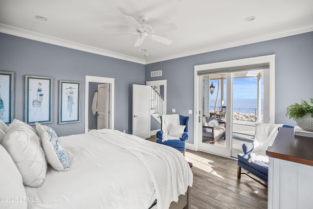 bedroom with access to exterior, visible vents, ornamental molding, and wood finished floors