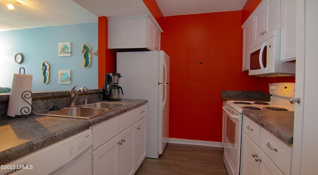 kitchen featuring sink, dark hardwood / wood-style flooring, electric panel, white appliances, and white cabinets