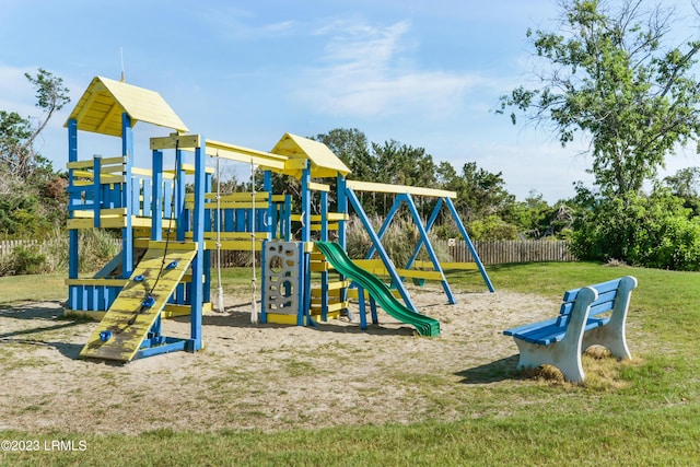 view of play area featuring a lawn