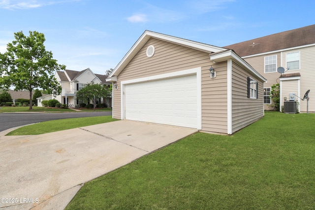 300 Campus Ln, Okatie, SC 29909 - view of side of property featuring a garage, a lawn, an outdoor structure, driveway, and central air condition unit