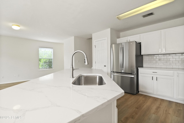 300 Campus Ln, Okatie, SC 29909 - kitchen featuring freestanding refrigerator, a sink, white cabinets, and dark wood-style flooring