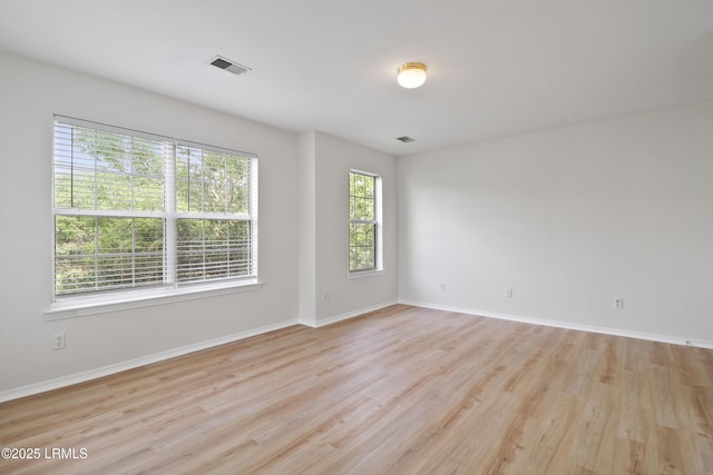 300 Campus Ln, Okatie, SC 29909 - spare room featuring light wood-type flooring and baseboards