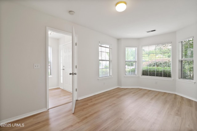 300 Campus Ln, Okatie, SC 29909 - unfurnished room with light wood-type flooring, a smoke detector, and baseboards