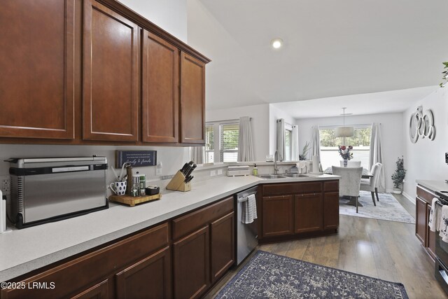 2110 River Rock Way, Beaufort, SC 29902 - kitchen with wood finished floors, dishwasher, light countertops, recessed lighting, and a peninsula