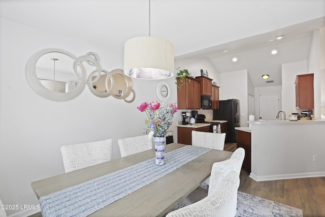 2110 River Rock Way, Beaufort, SC 29902 - dining space featuring wood finished floors, vaulted ceiling, and recessed lighting