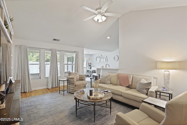 2110 River Rock Way, Beaufort, SC 29902 - living room featuring vaulted ceiling, a ceiling fan, and wood finished floors