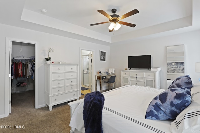 2110 River Rock Way, Beaufort, SC 29902 - bedroom with a raised ceiling, a spacious closet, dark carpet, ensuite bathroom, and ceiling fan