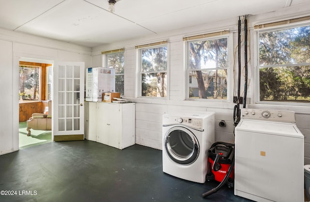 laundry room with washer and clothes dryer