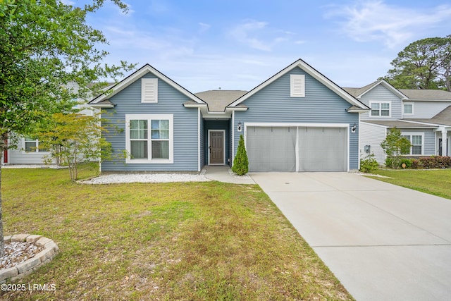 42 Pacolet Ln, Beaufort, SC 29906 - view of front facade featuring a front yard, driveway, and a garage