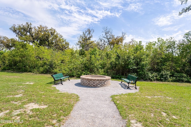 42 Pacolet Ln, Beaufort, SC 29906 - view of home's community featuring a yard, an outdoor fire pit, and a patio area