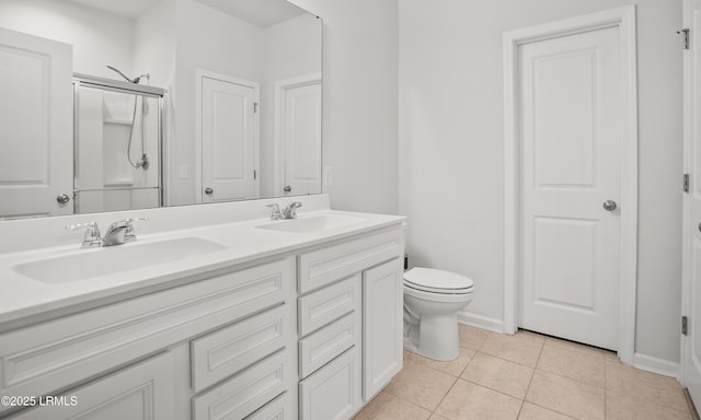 42 Pacolet Ln, Beaufort, SC 29906 - full bath with toilet, tile patterned floors, double vanity, and a sink