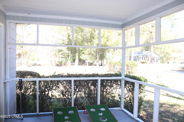 unfurnished sunroom featuring a healthy amount of sunlight