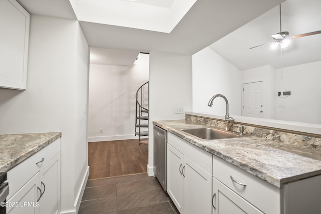 900 Brotherhood Rd Unit D6, Beaufort, SC 29902 - kitchen with a sink, baseboards, a ceiling fan, white cabinets, and vaulted ceiling