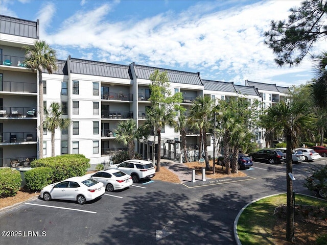 34 S Forest Beach Dr Unit B12, Hilton Head Island, SC 29928 - view of apartment building / complex featuring uncovered parking