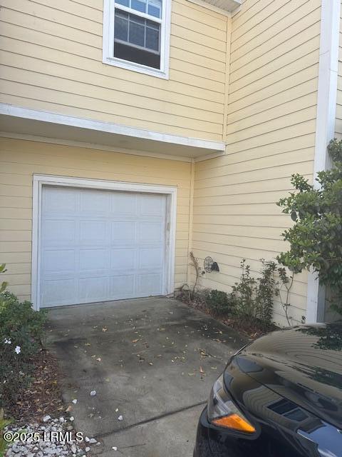 garage with driveway