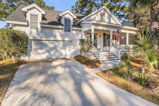 view of front facade featuring a garage and a porch