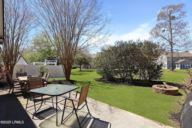 12 Elloree Way, Bluffton, SC 29910 - view of patio featuring outdoor dining area and an outdoor fire pit