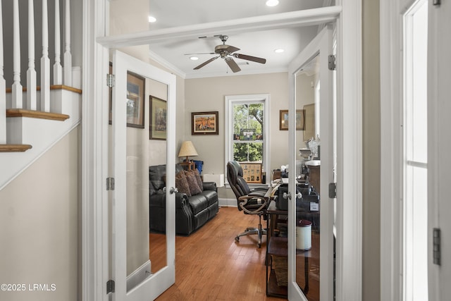 office featuring a ceiling fan, recessed lighting, crown molding, and wood finished floors