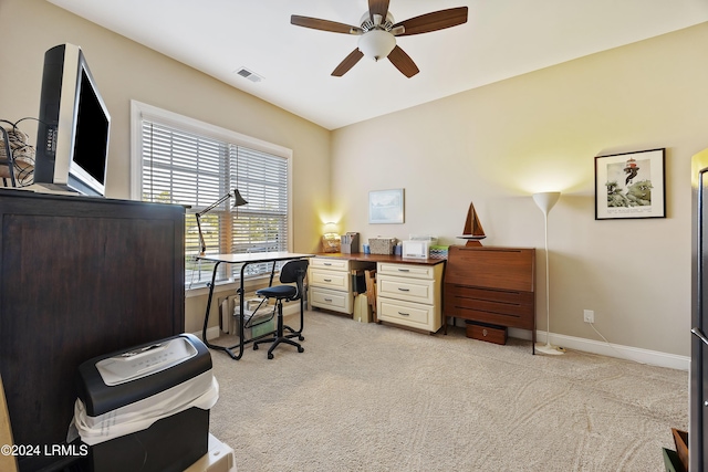 office featuring light colored carpet and ceiling fan