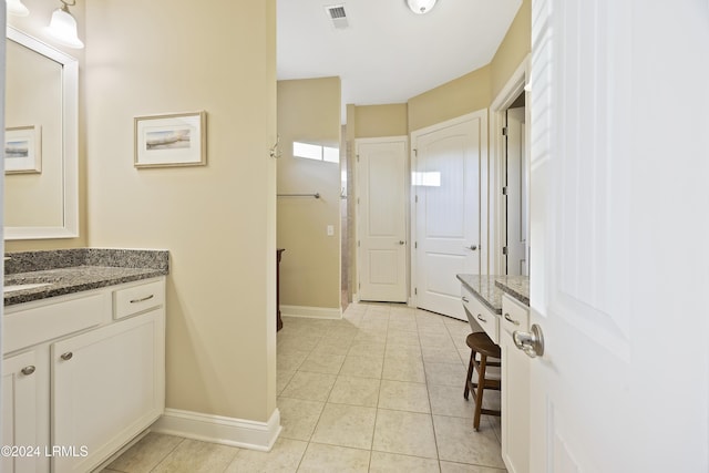 bathroom featuring vanity and tile patterned floors