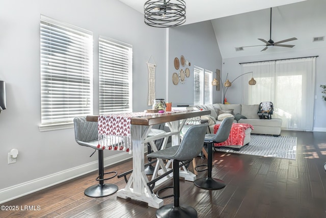 dining room featuring wood-type flooring, a healthy amount of sunlight, and ceiling fan