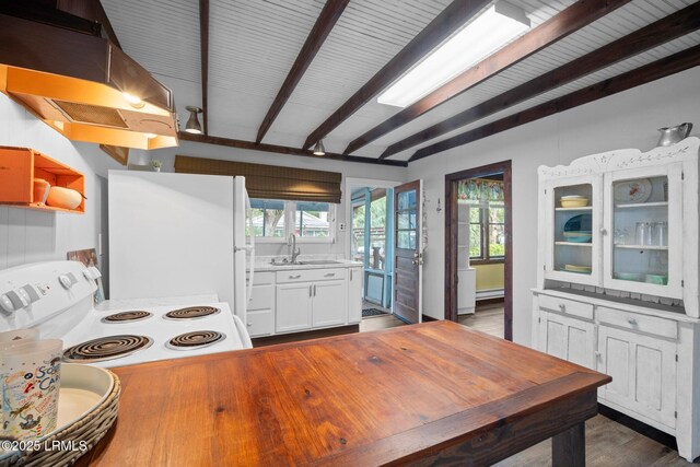 20 Trout St, Bluffton, SC 29910 - kitchen with white appliances, beamed ceiling, range hood, white cabinetry, and a sink