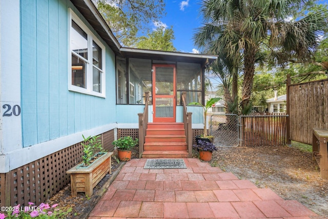 20 Trout St, Bluffton, SC 29910 - view of exterior entry featuring fence and a gate
