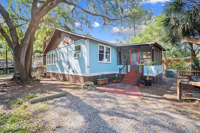 20 Trout St, Bluffton, SC 29910 - manufactured / mobile home with a sunroom, fence, and cooling unit