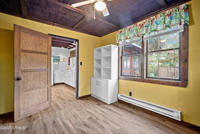 20 Trout St, Bluffton, SC 29910 - unfurnished room featuring baseboards, baseboard heating, wood ceiling, a ceiling fan, and light wood finished floors