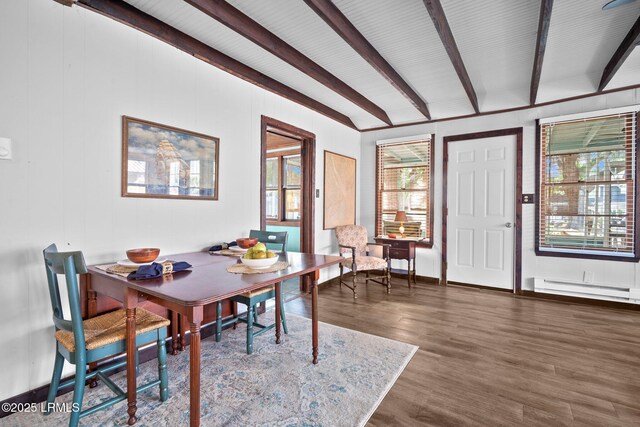 20 Trout St, Bluffton, SC 29910 - dining room featuring baseboards, a baseboard heating unit, wood finished floors, and beamed ceiling