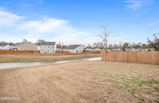 view of yard featuring a water view