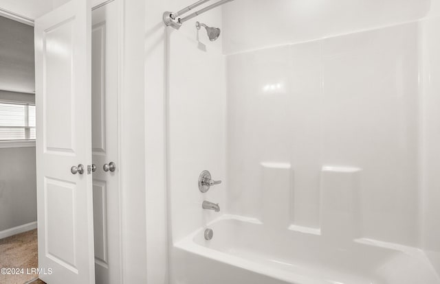 bathroom with shower / bathtub combination